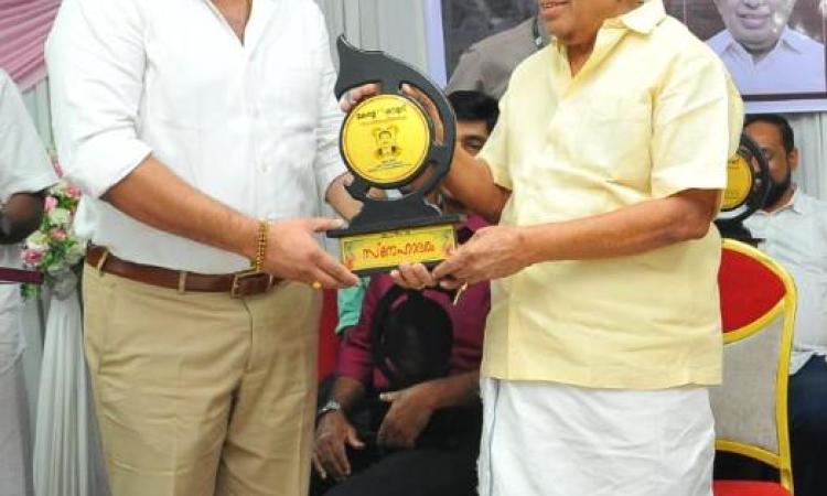 Award by Minister K Krishnamurthy  (Minister for Electricity of Kerala)